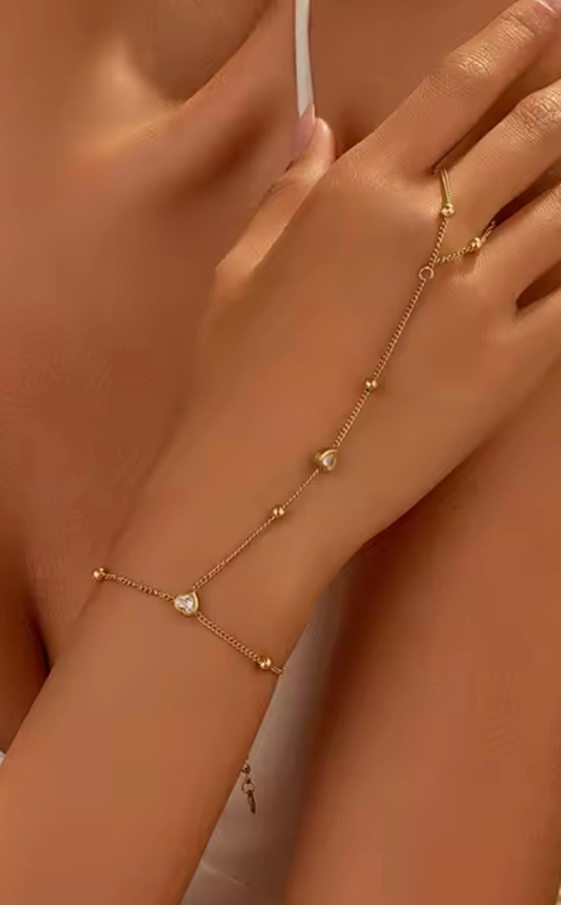 Bracelet linked to ring